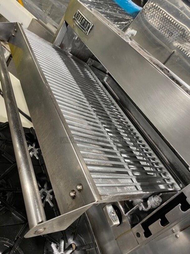 Garland Commercial Gas Powered 8 Burner Stove! With Raised Back Splash And Salamander! With Oven Underneath! All Stainless Steel! On Casters! - Image 10 of 11