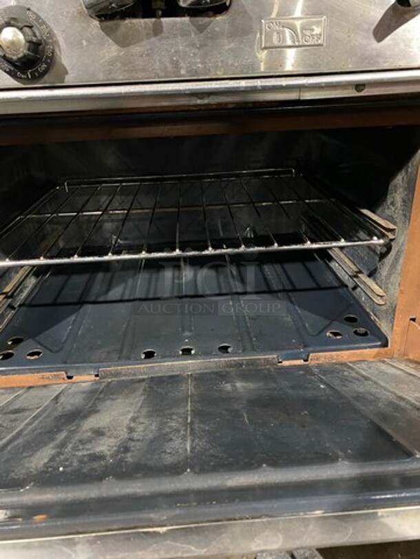 Garland Commercial Natural Gas Powered 6 Burner Stove! With Raised Back Splash And Salamander Shelf! With Oven Underneath! All Stainless Steel! On Casters! WORKING WHEN REMOVED! - Image 9 of 10