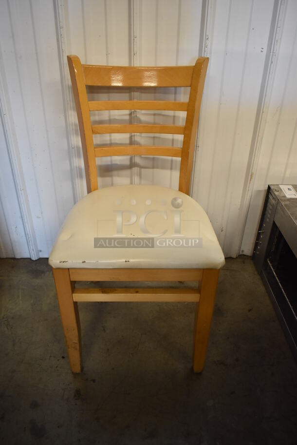 4 Wooden Dining Height Chairs w/ Tan Seat Cushion. Stock Picture - Cosmetic Condition May Vary. 17x20x34. 4 Times Your Bid!