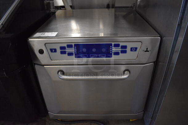 2010 Merrychef 402S Series V4 Stainless Steel Commercial Countertop Electric Powered Rapid Cook Oven. 208/240 Volts, 1 Phase. 23x27.5x23