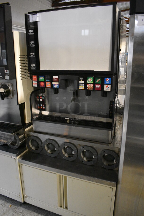 2017 Lancer Model FS30 Stainless Steel Commercial Countertop 16 Flavor Carbonated Beverage Machine on Stainless Steel Soda Station w/ 5 Cup Dispensers and 2 Doors. 115 Volts, 1 Phase. 36x43x76