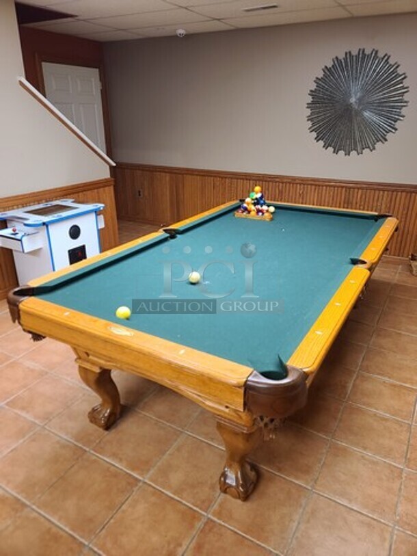 The CL Bailey Co Slate Pool Table w/ Green Felt Top, 2 Cues and 2 Ball Setting Racks. Unit Was Professionally Disassembled. Goes GREAT w/ Lots 7-9! 55.5x98x32.5