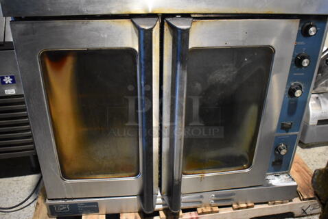 Duke Stainless Steel Commercial Natural Gas Powered Full Size Convection Oven w/ View Through Doors, Metal Oven Racks and Thermostatic Controls Comes w/ 4 Legs. 38.5x42x32. Legs 27"