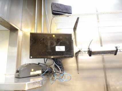 AOC Monitor, Clock, Epson Printer, Bump Bar. 
Location: Kitchen, Orange Dot Sticker