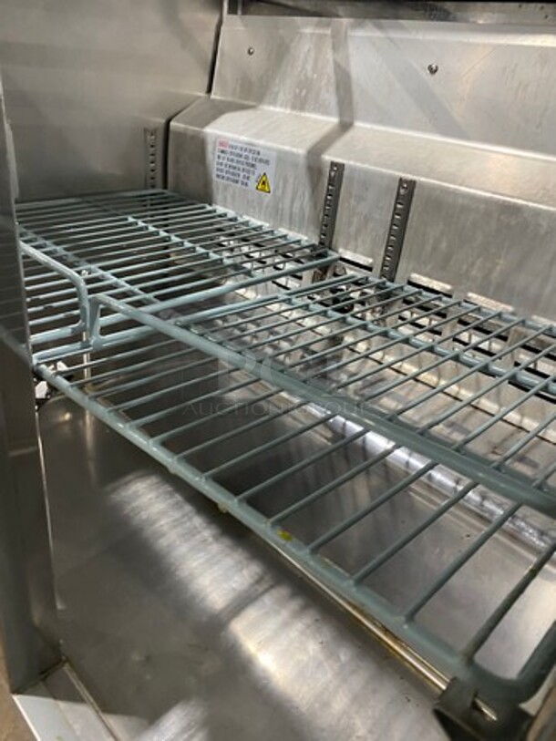 Universal Coolers Commercial Refrigerated Sandwich Prep Table! With 2 Door Storage Space Underneath! With Poly Coated Rack! All Stainless Steel! On Casters! Model: SC36BMI SN: 6733424419111105 115V - Image 6 of 10