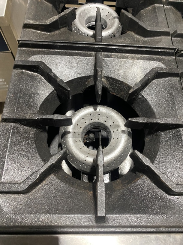 American Range Commercial Natural Gas Powered 4 Burner Stove! With Raised Back Splash! With Full Size Oven Underneath! All Stainless Steel! On Legs!
 - Image 6 of 8