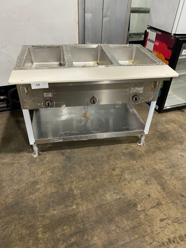 NEW! NEVER USED! Duke Commercial Electric Powered 3 Well Steam Table! With Storage Space Underneath! With Commercial Cutting Board! All Stainless Steel! On Casters! Model: E303M SN: 03041770! 208V 3 Phase! - Image 1 of 9