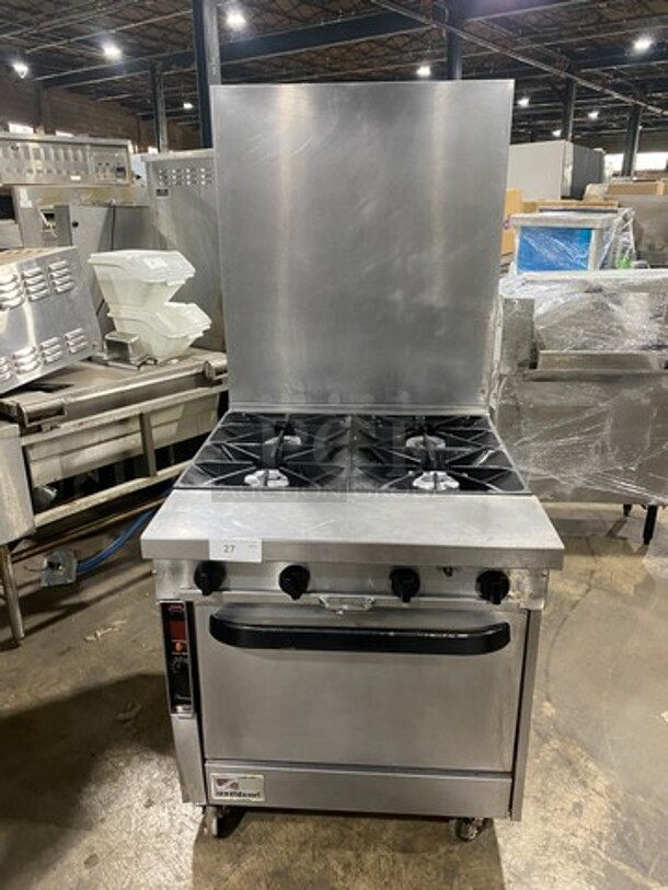 Southbend Commercial Natural Gas Powered 4 Burner Stove! With Raised Back Splash! With Oven Underneath! All Stainless Steel! On Casters! - Image 1 of 12