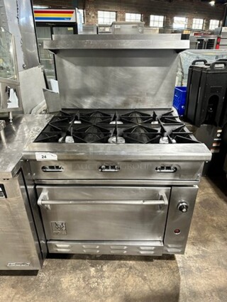Wolf Commercial Natural Gas Powered 6 Burner Stove! With Raised Back Splash And Salamander Shelf! With Oven Underneath! All Stainless Steel! On Legs!
