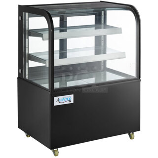 Avantco BC-36-HC 36" Curved Glass Black Refrigerated Bakery Display Case On Commercial 2" Casters With Adjust Glass Shelves & LED Lighting. Tested. Works Perfect. Exterior/Outer Glass is Damaged on Right Side. Interior Glass Is Fine. See Photos.