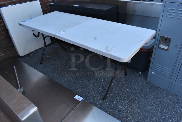 2 Folding Tables. 2 Times Your Bid!