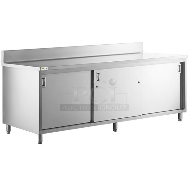BRAND NEW SCRATCH AND DENT! Regency 600EBTB3096D 30" x 96" 16 Gauge Type 304 Stainless Steel Enclosed Base Sliding Door Table with Adjustable Midshelf and 6" Backsplash - Image 1 of 8