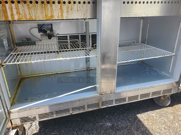 Beverage-Air SPE48-18M 48" 2-door Refrigerated Sandwich Salad Prep 48X34X36 On Caster, Unknown Condition, SOLD AS IS!  - Image 3 of 4