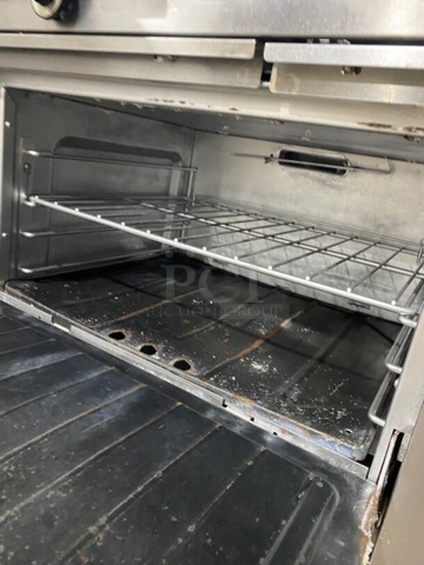 Garland Commercial Natural Gas Powered 6 Burner Stove! With Raised Back Splash And Salamander Shelf! With Oven Underneath! All Stainless Steel! On Legs! - Image 7 of 8