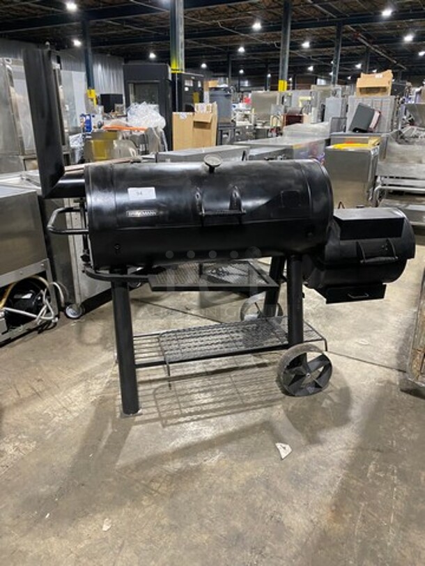 BEAUTIFUL! AWESOME! Brinkmann Trailmaster Heavy Duty Charcoal Grill/ Smoker! Small Grill Has Charcoal Access! With Hinged Lids! With Storage Space Underneath! Heavy Duty Steel! On Legs And Casters! - Image 1 of 10