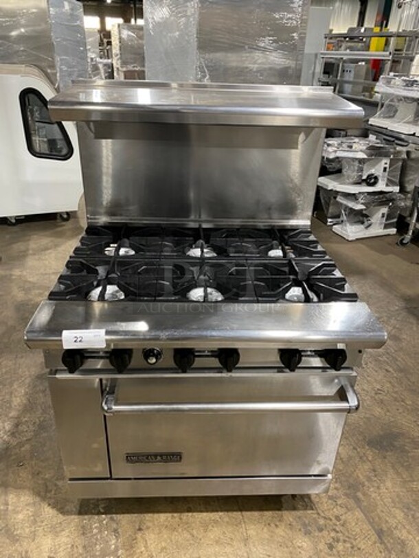 American Range Natural Gas Powered 6 Burner Stove! With Full Size Oven Underneath! With Raised Back Splash And Salamander Shelf! All Stainless Steel! On Casters!