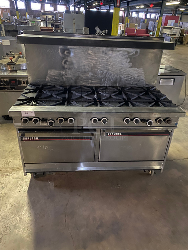 Garland Commercial Natural Gas Powered 10 Burner Stove! With 2 Full-Size Ovens Underneath! With Metal Oven Racks! With Raised Back Splash & Salamander Shelf! Stainless Steel! On Casters!