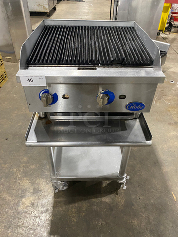 Globe Commercial Countertop Natural Gas Powered Char Grill! With Back And Side Splashes! On Small Legs! On Equipment Stand! With Storage Space Underneath! All Stainless Steel! On Casters!