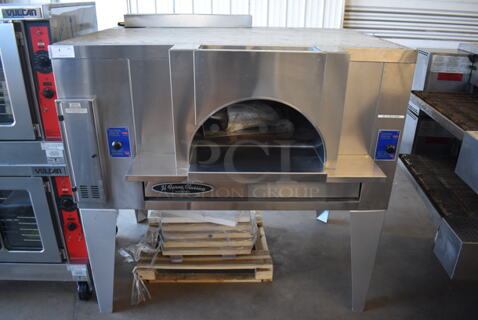 BRAND NEW! 2019 Bakers Pride FC-516 Stainless Steel Commercial Natural Gas Powered / Coal Burning / Wood Fired Il Forno Pizza Oven w/ Cooking Stones on Metal Legs. 140,000 BTU. 65.5x54x67