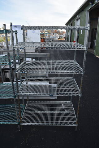 Chrome Finish 4 Tier Wire Shelving Unit. BUYER MUST DISMANTLE. PCI CANNOT DISMANTLE FOR SHIPPING. PLEASE CONSIDER FREIGHT CHARGES.