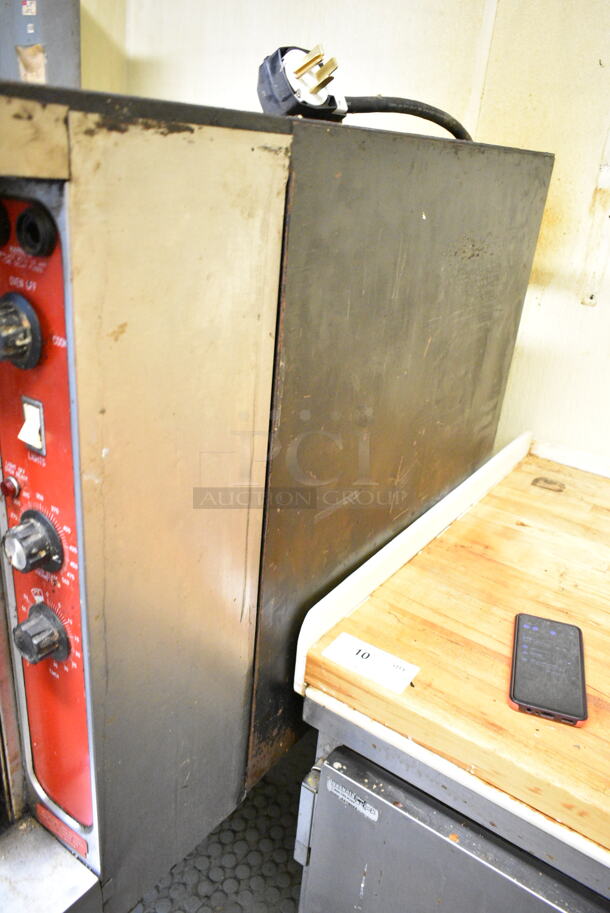 Blodgett Stainless Steel Commercial Electric Powered Full Size Convection Oven w/ Solid Doors, Metal Oven Racks and Thermostatic Controls on Metal Legs. 3 Phase. This Unit Was In Working Condition When the Restaurant Closed. (kitchen) - Image 7 of 9
