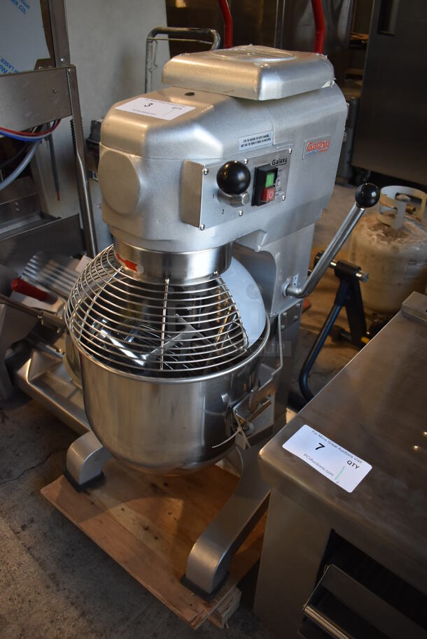 BRAND NEW SCRATCH AND DENT! Galaxy 177GMIX20 Metal Commercial Floor Style 20 Quart Planetary Dough Mixer w/ Stainless Steel Mixing Bowl, Bowl Guard, Dough Hook, Balloon Whisk and Paddle Attachments. Missing Fan Back Cover. 110 Volts, 1 Phase. 15x20x33. Tested and Working!