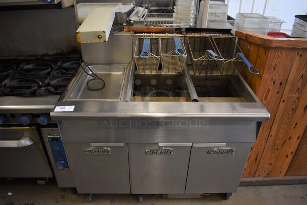 Imperial IFSCB250T Stainless Steel Commercial Natural Gas Powered 2 Bay Deep Fat Fryer w/ Left Side Dumping Station and 4 Metal Fry Baskets on Commercial Casters. 280,000 BTU. 46.5x33.5x51.5 - Image 1 of 12
