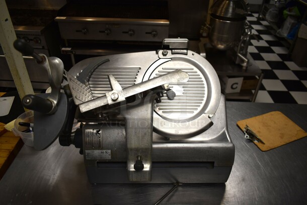 Hobart 2712 Stainless Steel Commercial Countertop Automatic Meat Slicer w/ Blade Sharpener. 115 Volts, 1 Phase. Tested and Working! (kitchen) - Image 1 of 9