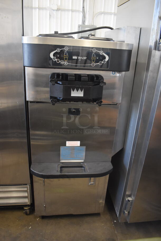 2012 Taylor C723-33 2 Flavor Air Cooled Ice Cream Yogurt Machine on Storage Cabinet with Extra Parts on Commercial Casters. 208-230 Volts 3 Phase