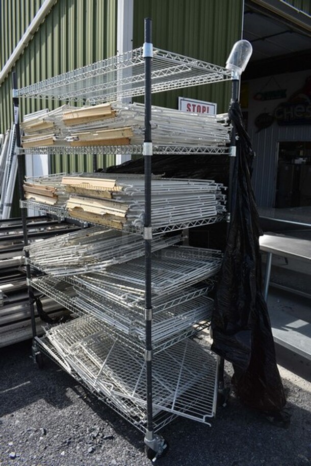 ALL ONE MONEY! Metro Chrome and Black Finish 6 Tier Shelving Unit on Commercial Casters w/ Lot of Poly Coated Racks. BUYER MUST DISMANTLE. PCI CANNOT DISMANTLE FOR SHIPPING. PLEASE CONSIDER FREIGHT CHARGES. 48x24x78 - Image 5 of 5