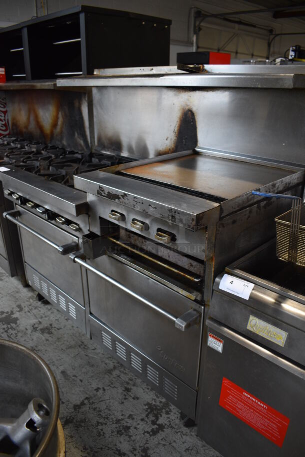 Garland SunFire Stainless Steel Commercial Natural Gas Powered 6 Burner Range w/ Flat Top Griddle, 2 Ovens, Over Shelf and Back Splash on Commercial Casters. 60x33x60 - Image 5 of 11