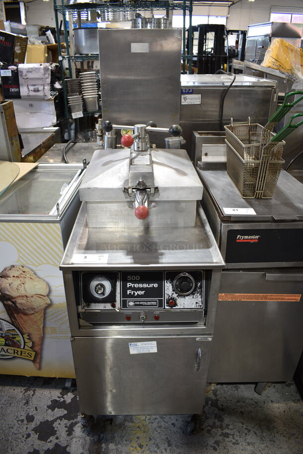 Henny Penny 500 Stainless Steel Commercial Floor Style Electric Powered Pressure Fryer w/ Metal Fry Basket on Commercial Casters. 208 Volts, 3 Phase.  - Image 1 of 10