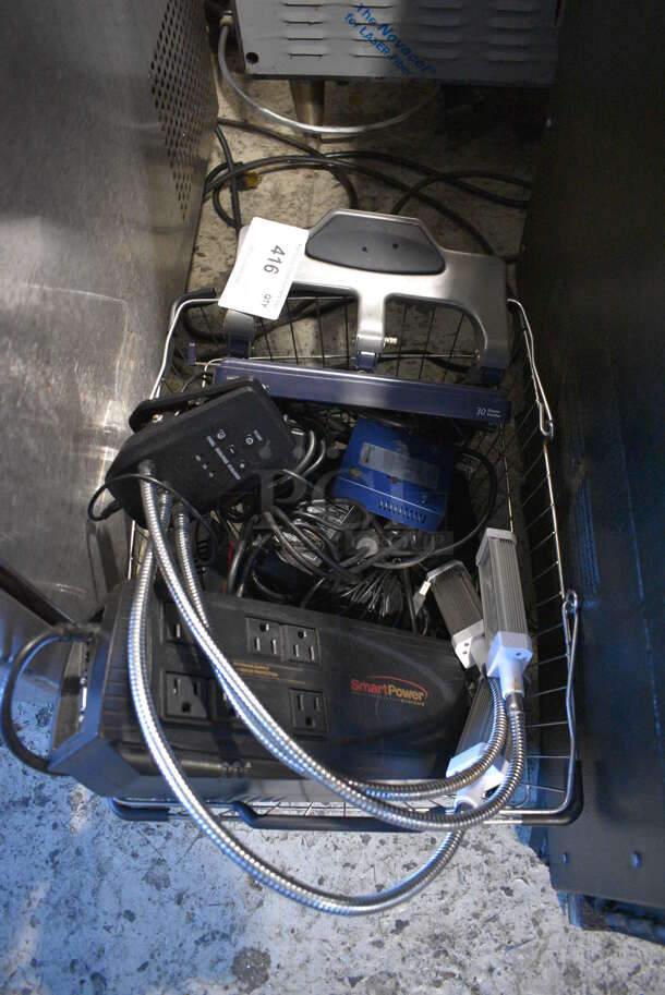ALL ONE MONEY! Lot of Various Items Including Uninterruptible Power Supply in Wire Basket