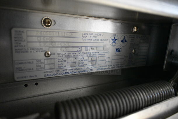 BRAND NEW SCRATCH AND DENT! 2024 Garland G36-6R Stainless Steel Commercial Natural Gas Powered 6 Burner Range w/ Oven, Over Shelf and Back Splash.  - Image 8 of 9