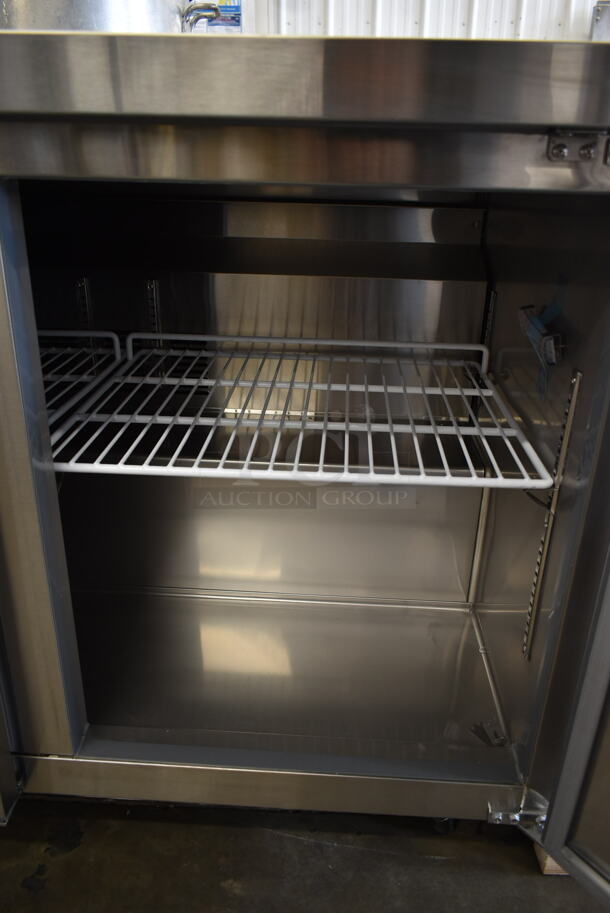 BRAND NEW SCRATCH AND DENT! 2023 Avantco 178SSUC72RHC Stainless Steel Commercial 3 Door Undercounter Cooler on Commercial Casters. 115 Volts, 1 Phase. Tested and Working! - Image 10 of 10