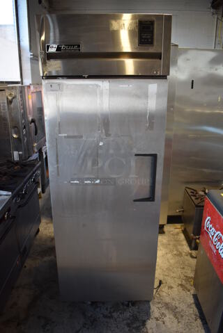True TG1R-1S Stainless Steel Commercial Single Door Reach In Cooler w/ Poly Coated Racks on Commercial Casters. 115 Volts, 1 Phase. 29x35x83. Tested and Working!