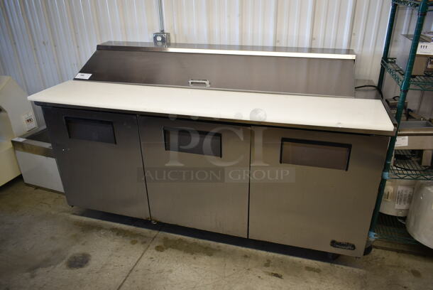 True TSSU-72-18 Stainless Steel Commercial Sandwich Salad Prep Table Bain Marie Mega Top w/ Black Poly Drop In Bins on Commercial Casters. 115 Volts, 1 Phase. Tested and Powers On But Does Not Get Cold - Image 1 of 8