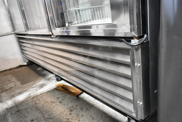 True T-72G Stainless Steel Commercial 3 Door Reach In Cooler Merchandiser w/ Poly Coated Racks on Commercial Casters. 115 Volts, 1 Phase. Tested and Working! - Image 4 of 9