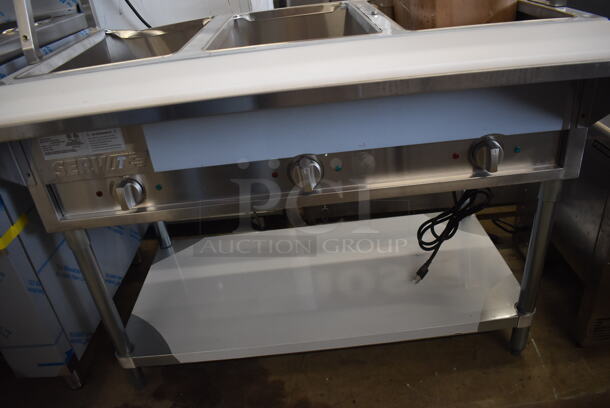 	BRAND NEW SCRATCH AND DENT! ServIt 423EST3WO Stainless Steel Commercial Electric Powered Three Pan Open Well Steam Table with Angled Sneeze Guard and Casters. 120 Volts, 1 Phase. - Image 7 of 10