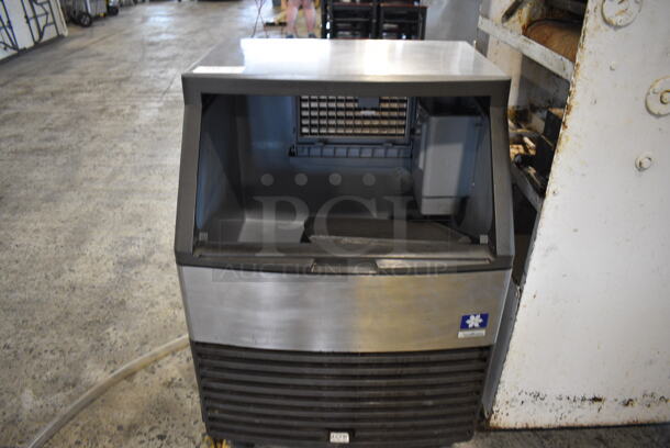 Manitowoc Model QD0132A Stainless Steel Commercial Self Contained Ice Machine. 115 Volts, 1 Phase. 26x26x39