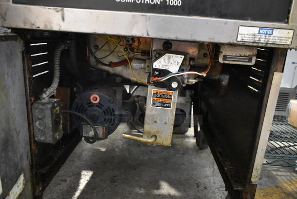 Henny Penny OFG-341 Stainless Steel Commercial Floor Style Natural Gas Powered Deep Fat Fryer w/ 2 Metal Fry Baskets. 80,000 BTU.  - Image 6 of 7