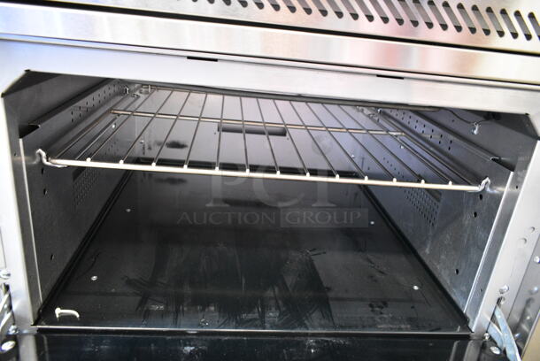 BRAND NEW! Vulcan EV36S-6FP208 Endurance Series Stainless Steel Commercial 36" Electric Powered 6 French Plate Range w/ Oven and Back Splash. 208 Volts, 1/3 Phase. - Image 5 of 7