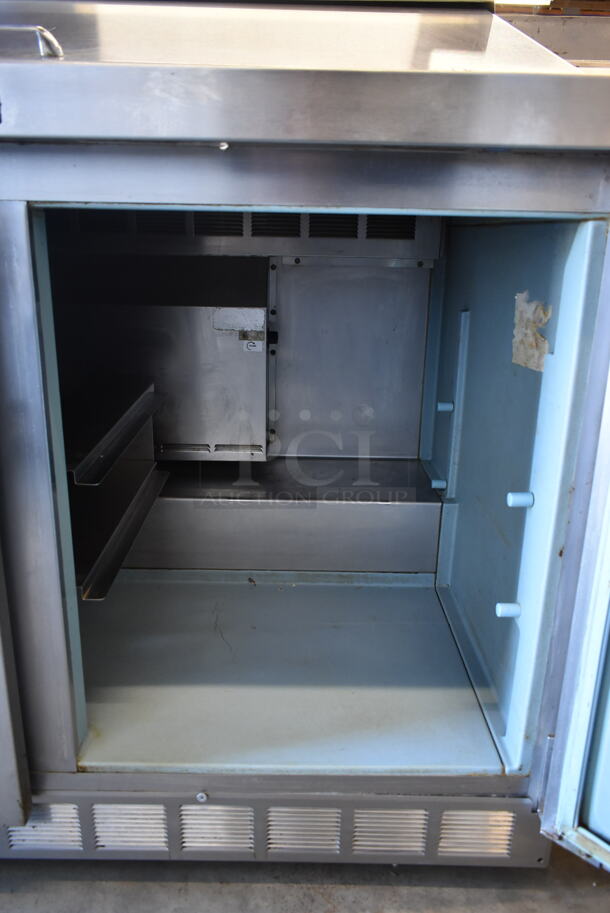 Delfield Stainless Steel Commercial Sandwich Salad Prep Table Bain Marie Mega Top on Commercial Casters. 115 Volts, 1 Phase. Tested and Powers On But Does Not Get Cold  - Image 6 of 9