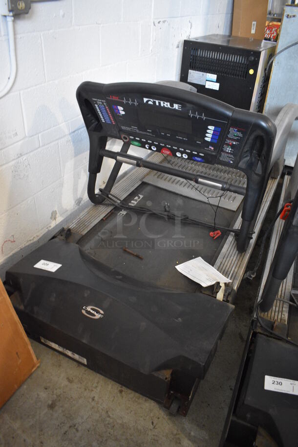 True Model ZTX 850HRC Treadmill. Comes In Two Pieces. 120 Volts, 1 Phase. 33x77x11, 33x28x53