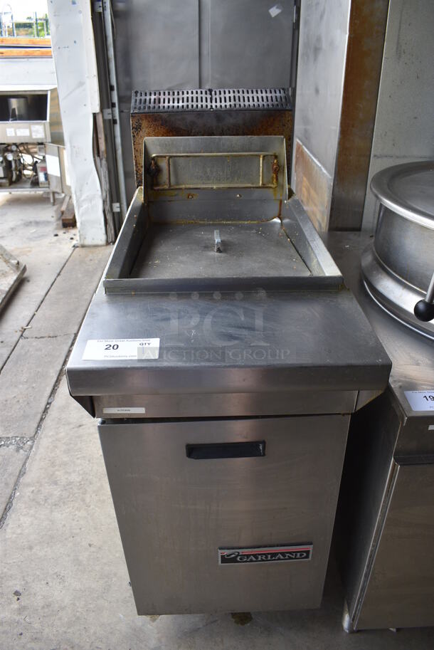Garland Model M35SS Stainless Steel Commercial Floor Style Natural Gas Powered Deep Fat Fryer w/ 2 Metal Fry Baskets on Commercial Casters. 17x38x46