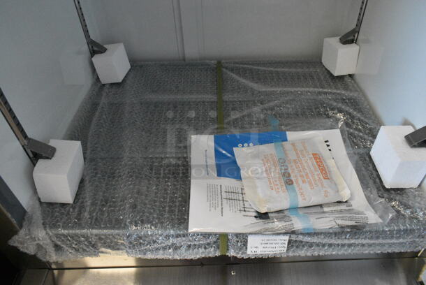 BRAND NEW SCRATCH AND DENT! 2024 Avantco 178A19FHC Stainless Steel Commercial Single Door Reach In Freezer w/ Poly Coated Racks. 115 Volts, 1 Phase. Tested and Working! - Image 5 of 6