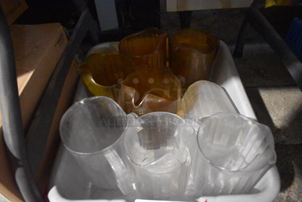 ALL ONE MONEY! Lot of Various Poly Pitchers in Gray Poly Bus Bin. 7.5x7.5x8 - Image 1 of 3