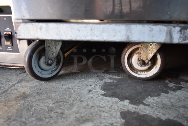 2014 Pitco Frialator 40D Stainless Steel Commercial Floor Style Natural Gas Powered Deep Fat Fryer on Commercial Casters. 115,000 BTU.  - Image 9 of 9