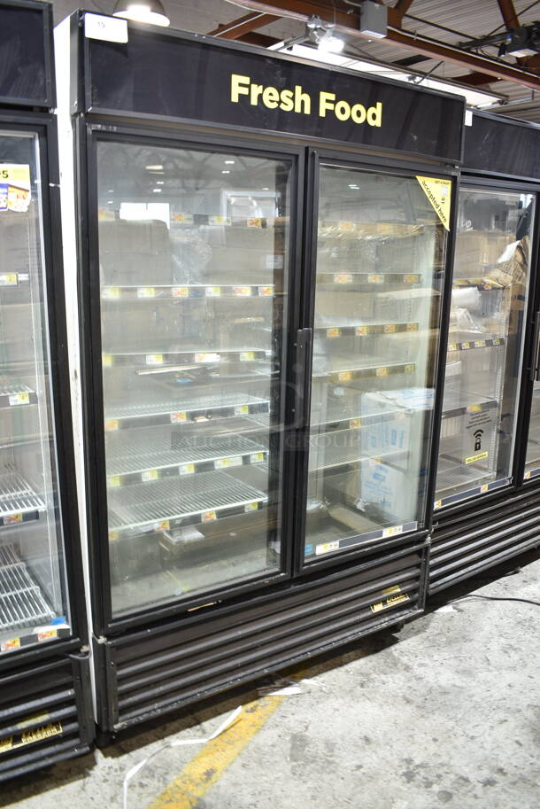 2015 True GDM-49-LD ENERGY STAR Metal Commercial 2 Door Reach In Cooler Merchandiser w/ Poly Coated Racks on Commercial Casters. 115 Volts, 1 Phase. Tested and Working! - Image 1 of 6