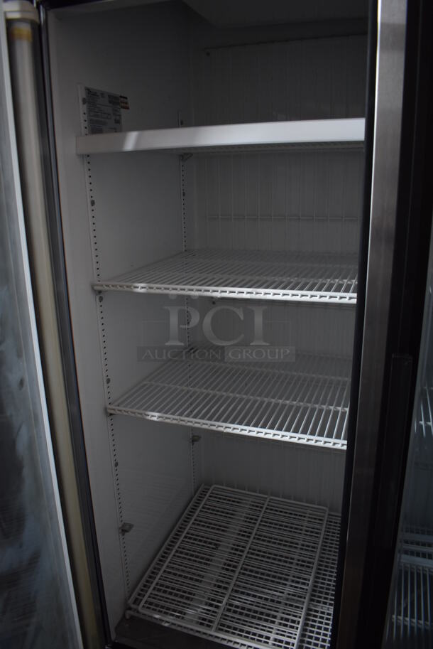 True GDM-43F Metal Commercial 2 Door Reach In Freezer Merchandiser w/ Poly Coated Racks and Sliding Doors on Commercial Casters. 115/208-230 Volts, 1 Phase - Image 4 of 5